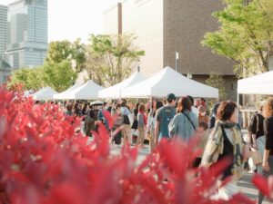 Shoppers walk through the Kitahama Autumn Marketplace at Nakanoshima in Osaka