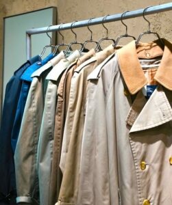 Fall jackets and vintage clothing from Raumvintage displayed on a rack at the Kitahama Autumn Flea Market in Osaka.