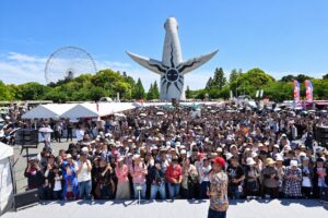 Visitors enjoying a previous Bakushoku Onsai food and music festival at Expo ’70 Commemorative Park in Suita, Osaka.